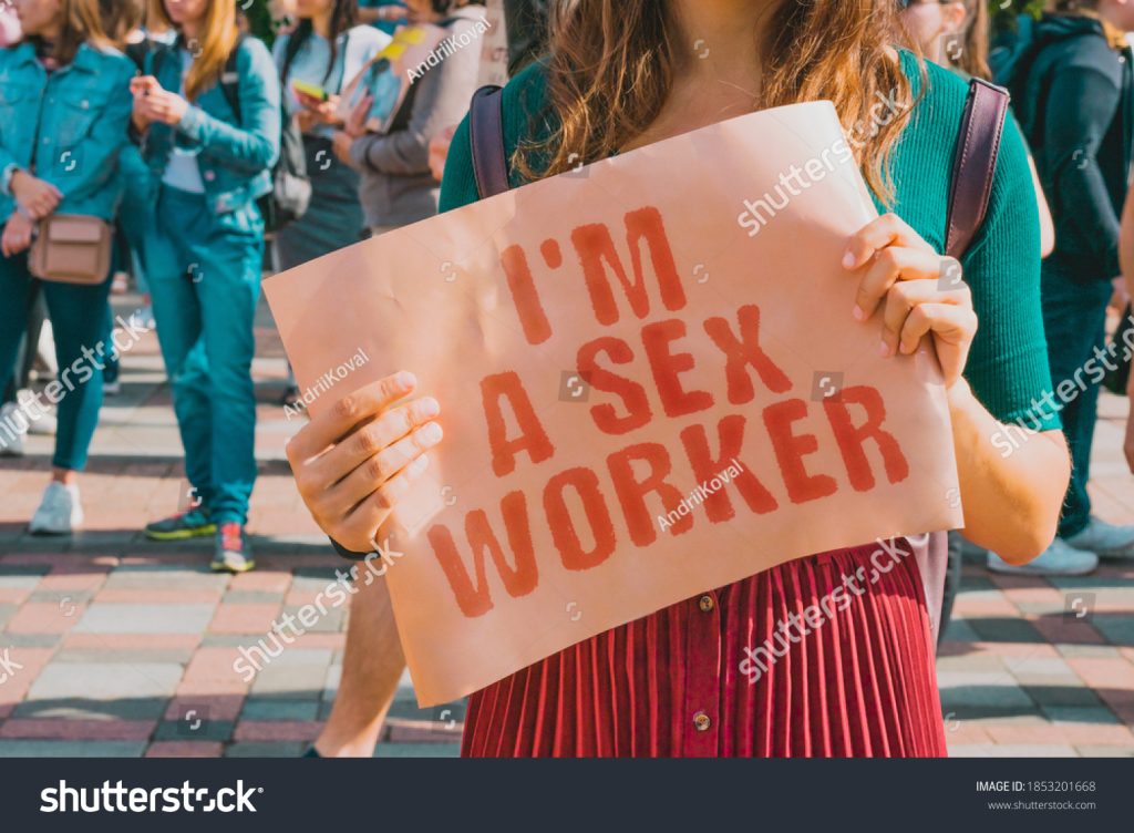 Stock Photo The Phrase I M A Sex Worker On A Banner In Women S Hand Girl Holds A Cardboard With An 1853201668